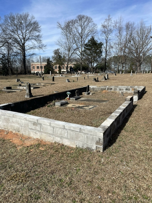 Crumbling wall was repaired at the Stinchcomb plot in the African American Cemetery Photo by Gail Jenkins ©2024
